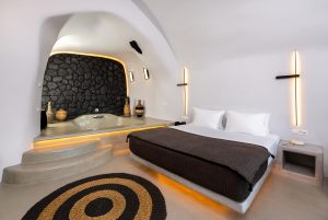 nostos-apartments-luxury-bedroom-bed-interior-cave-house (4)